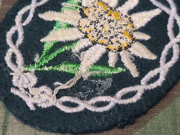 Unissued Embroidered Edelweiss Gebirgsjäger Patch Bottle Green Wool