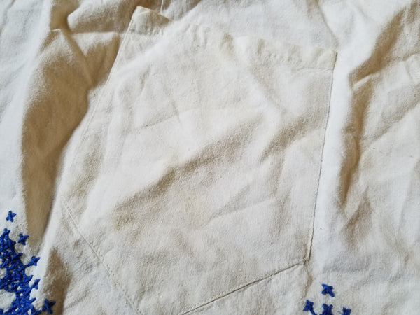 German Apron with Blue Needlework Designs