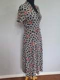 Flower and Person in Archway Novelty Print Dress <br> (B-41" W-28" H-41")