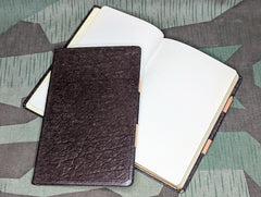 Brown Notebook with Graph Paper and Pencil