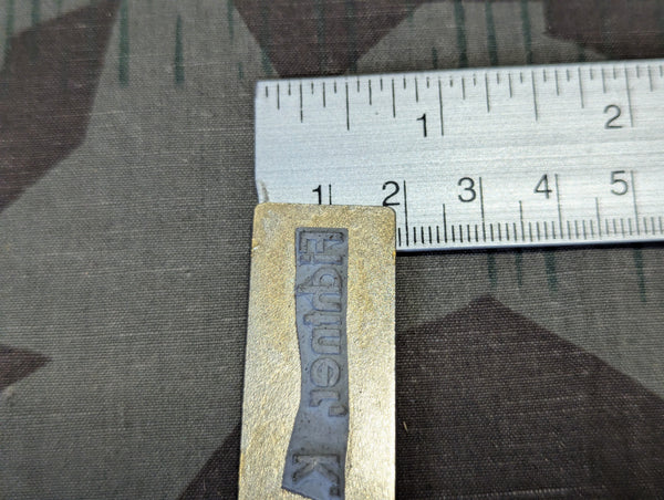Small Bakelite Pocket Stamp