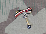 Iron Cross Buttonhole Device
