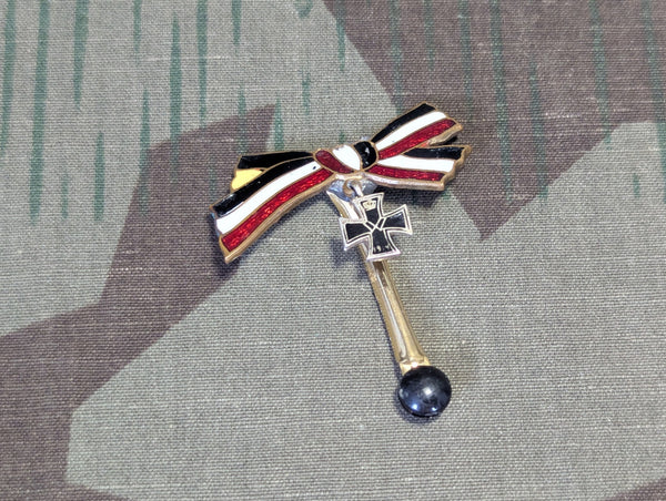 Iron Cross Buttonhole Device