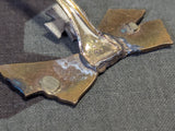 Iron Cross Buttonhole Device