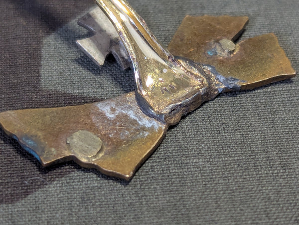 Iron Cross Buttonhole Device