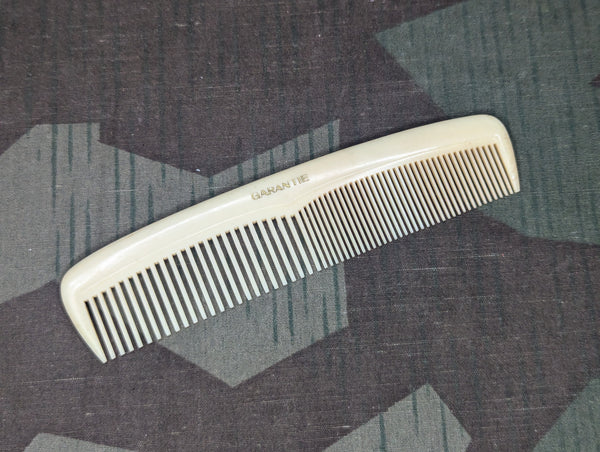 German White Plastic Comb Garantie