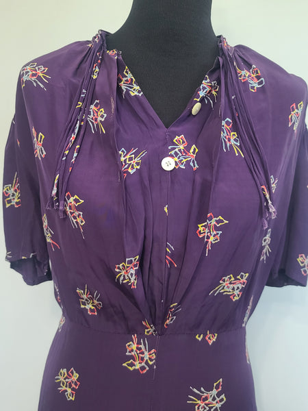 Purple Dress with Bow Print <br> (B-40" W-30" H-37")