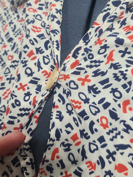 Symbols Novelty Print Dress <br> (B-41" W-35" H-41")