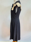Black Dress with White Lace and Buttons <br> (B-36" W-29" H-35")