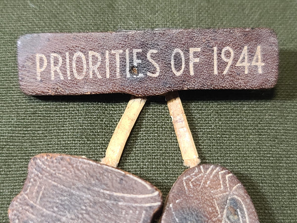 Priorities of 1944 Leather Pin