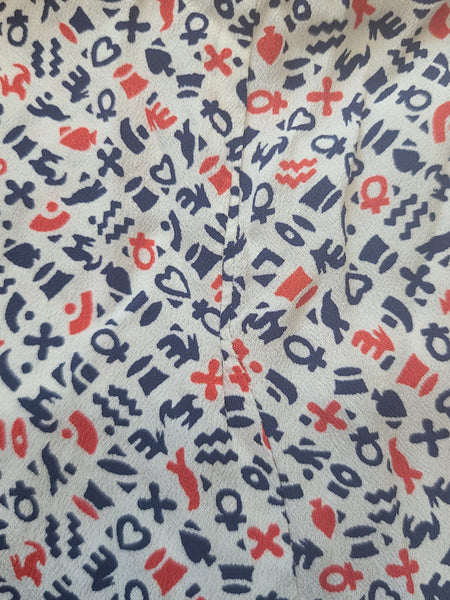 Symbols Novelty Print Dress <br> (B-41" W-35" H-41")