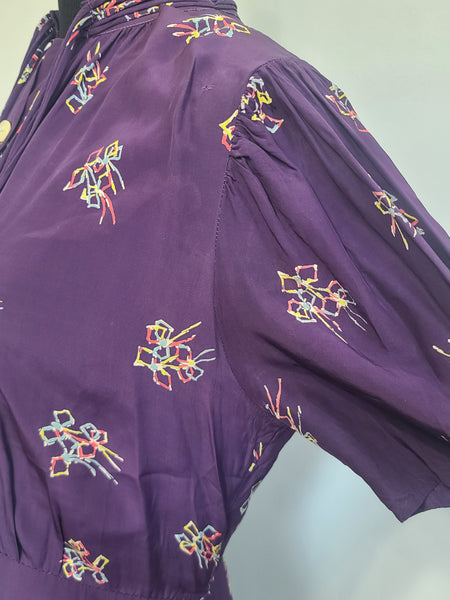 Purple Dress with Bow Print <br> (B-40" W-30" H-37")