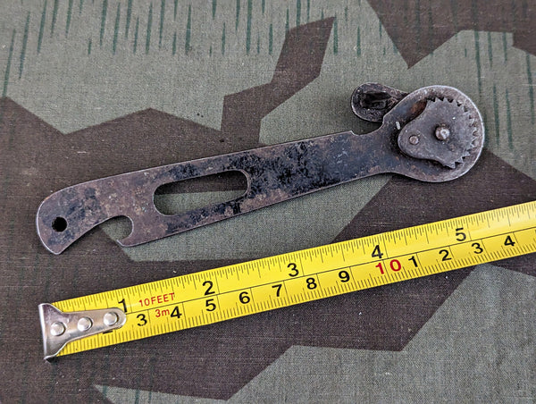 Period German Can and Bottle Opener Delta