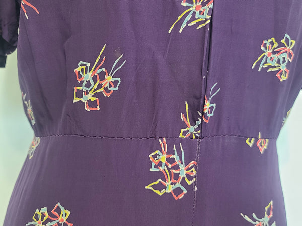 Purple Dress with Bow Print <br> (B-40" W-30" H-37")