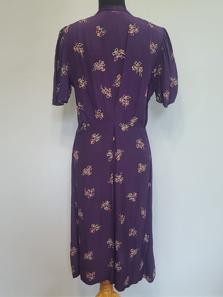 Purple Dress with Bow Print <br> (B-40" W-30" H-37")