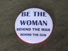 Repro "Be the Woman Behind the Man Behind the Gun" Pinback Button