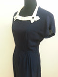 Dark Blue Dress w/ White Trim <br> (B-38" W-29" H-36")