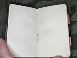 Black Notebook with Graph Paper