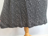 German Black Dress with White Swirl Designs <br> (B-40" W-29.5" H-41")