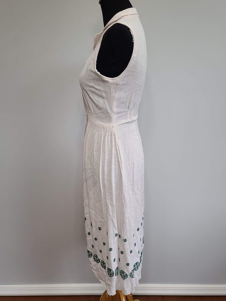 Off-White Sleeveless Dress with Green Design on Skirt <br> (B-35.5" W-26" H-39")