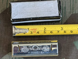 Tiny Hohner Puck Harmonica