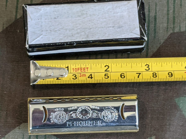 Tiny Hohner Puck Harmonica