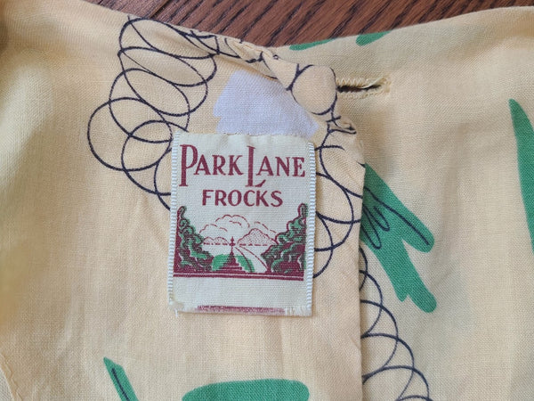 Yellow Abstract Flower Print Dress <br> (B-38" W-30" H-42")