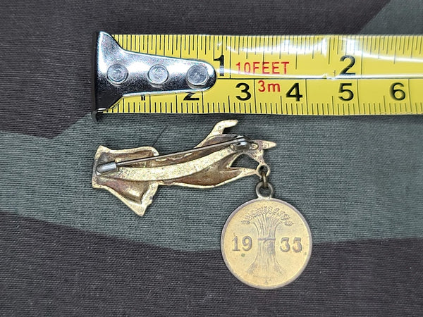 Hand with Reichspfennig 1933 Coin Pin