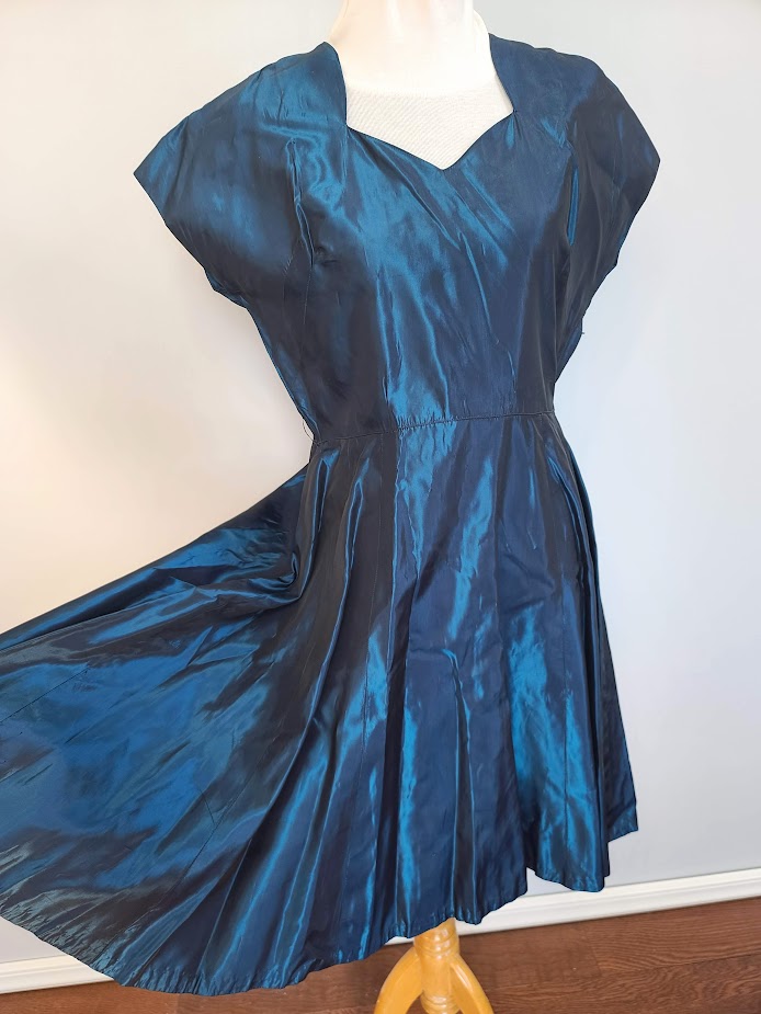Blue Shiny Iridescent Dress (B-40" W-31" H-48") Blue Shiny Iridescent Dress (B-40" W-31" H-48")
