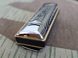 Tiny Hohner Puck Harmonica