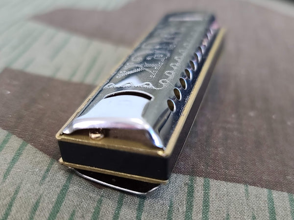 Tiny Hohner Puck Harmonica