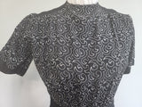 German Black Dress with White Swirl Designs <br> (B-40" W-29.5" H-41")