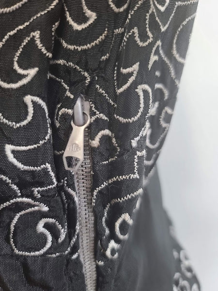 German Black Dress with White Swirl Designs <br> (B-40" W-29.5" H-41")