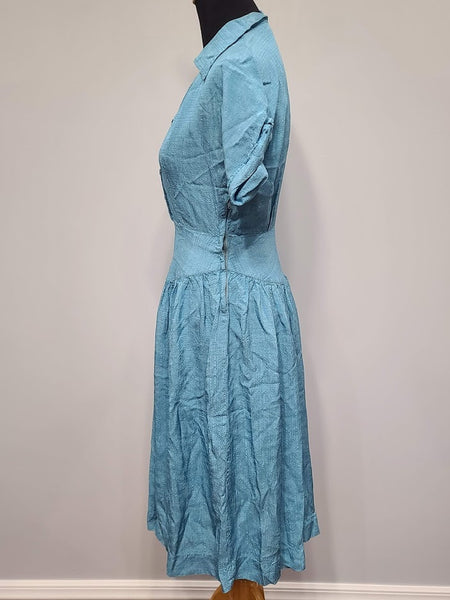 Blue Dress with Flower Buttons <br> (B-38" W-27" H-48")