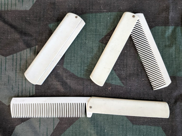 Vintage WWII-era German White Celluloid Folding Combs