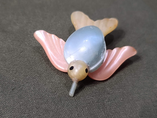Early Plastic Bird Pin