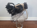 Beige Tilt Hat with Black Feathers