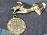 Hand with Reichspfennig 1933 Coin Pin