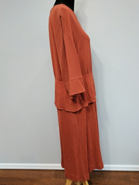 Orange Peplum Dress <br> (B-43" W-36" H-44")