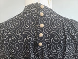 German Black Dress with White Swirl Designs <br> (B-40" W-29.5" H-41")