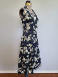 Black Sunflower Print Halter Dress <br> (B-30" W-25" H-40")