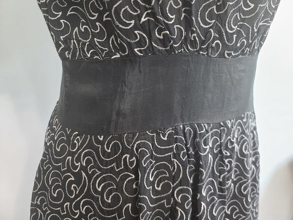 German Black Dress with White Swirl Designs <br> (B-40" W-29.5" H-41")
