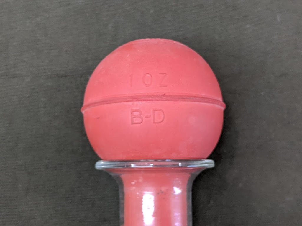 Wartime Glass and Rubber Evacuator Syringe