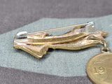 Hand with Reichspfennig 1933 Coin Pin