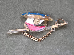 Early Plastic Hat and Sword Pin