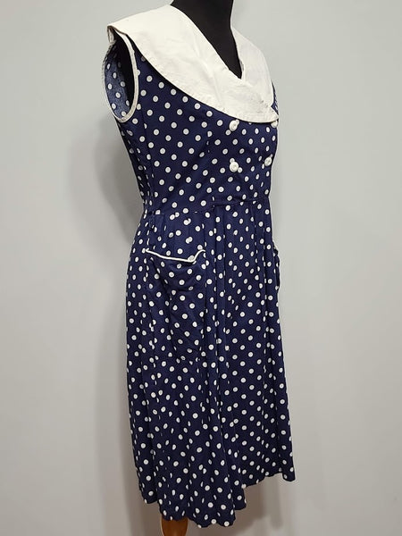 Blue Polka Dot Sleeveless Dress <br> (B-38" W-30" H-40")