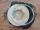 Beige Tilt Hat with Black Feathers