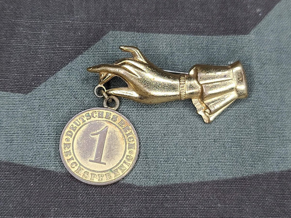 Hand with Reichspfennig 1933 Coin Pin